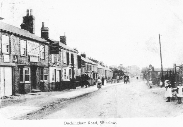 Postcard labelled Buckingham Road, with The Stag on the left